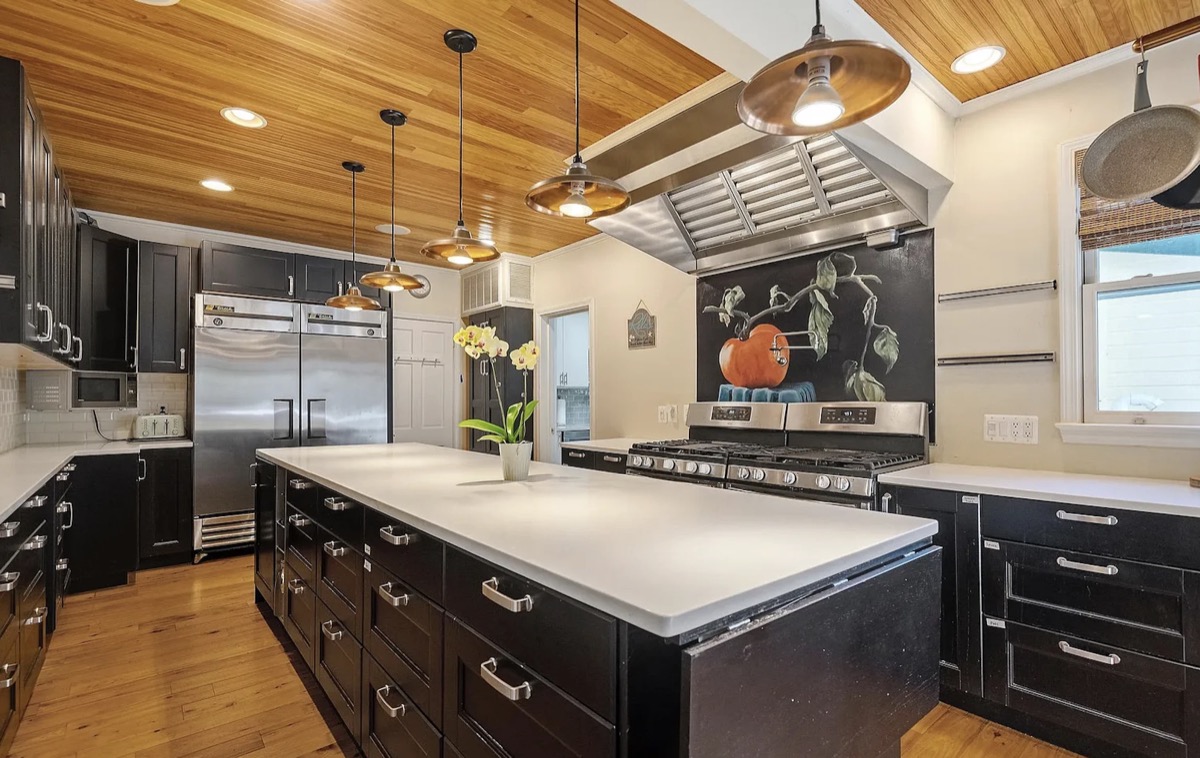 Inn kitchen with copper pendant lights